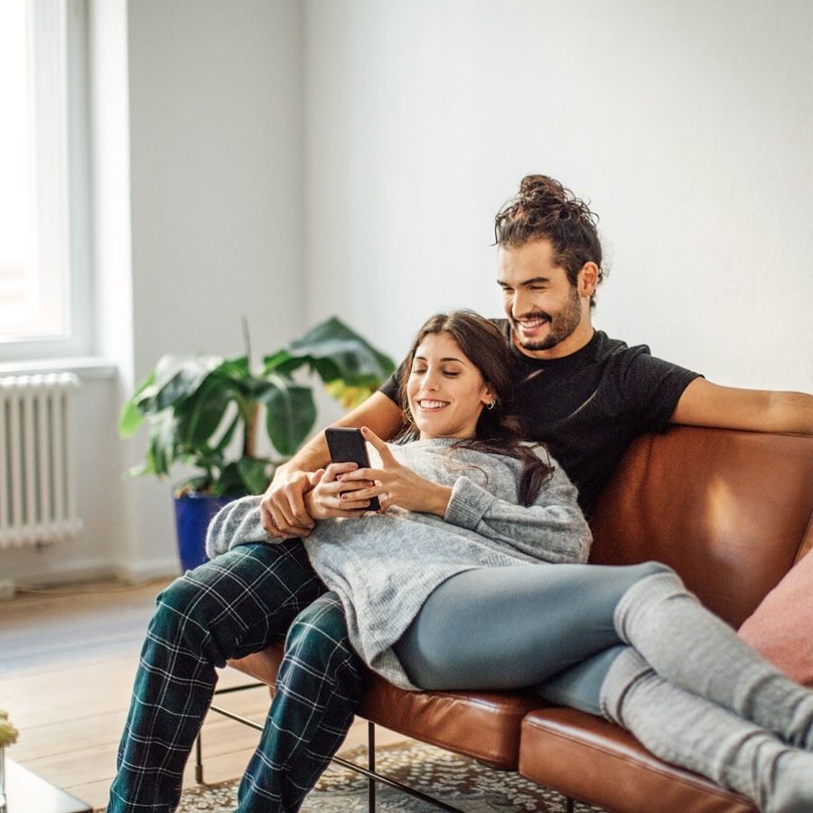 couple sitting on a sofa